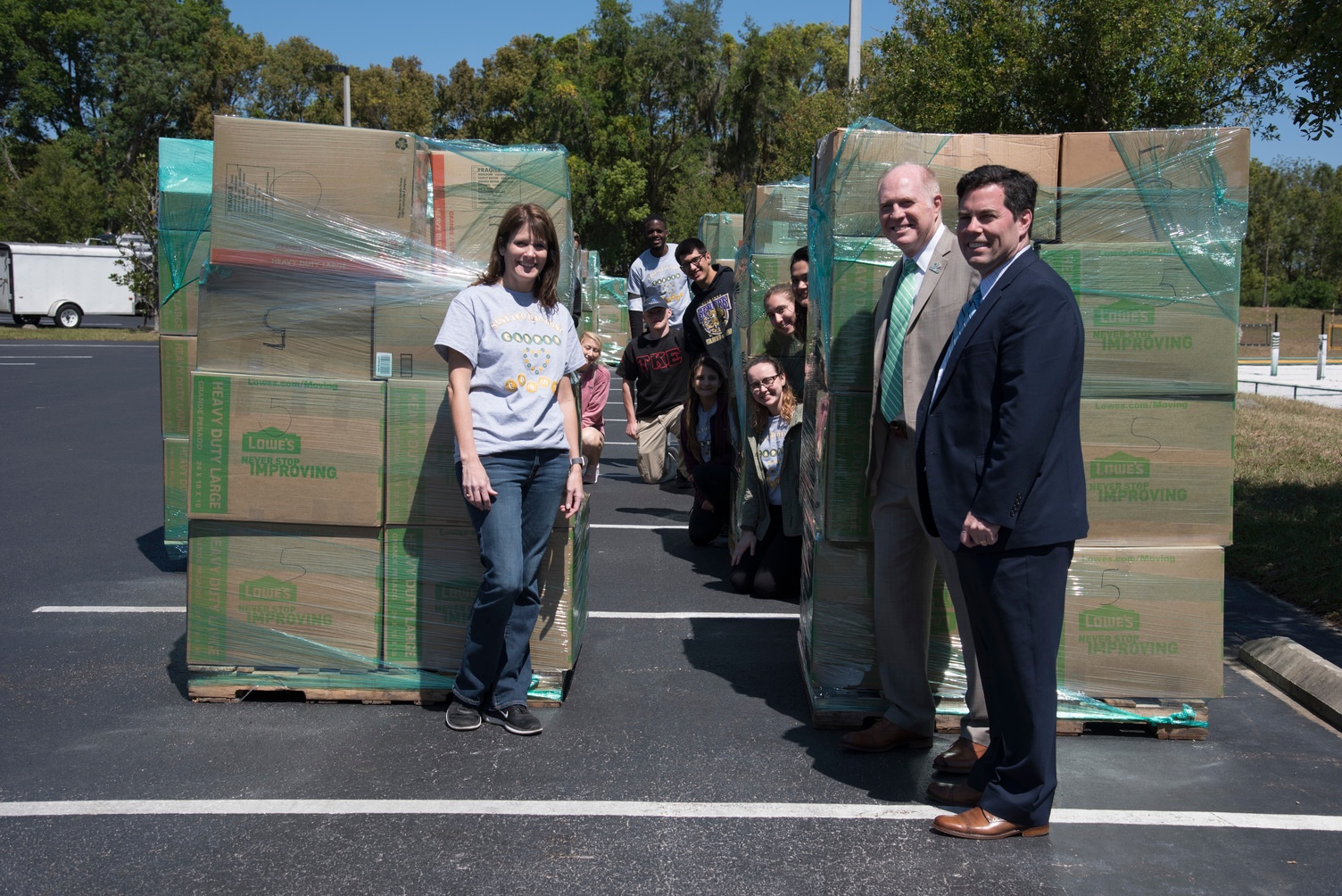photo of Heidi, Dr. Lennox, Dr. Senese and students, Caps of Love send-off